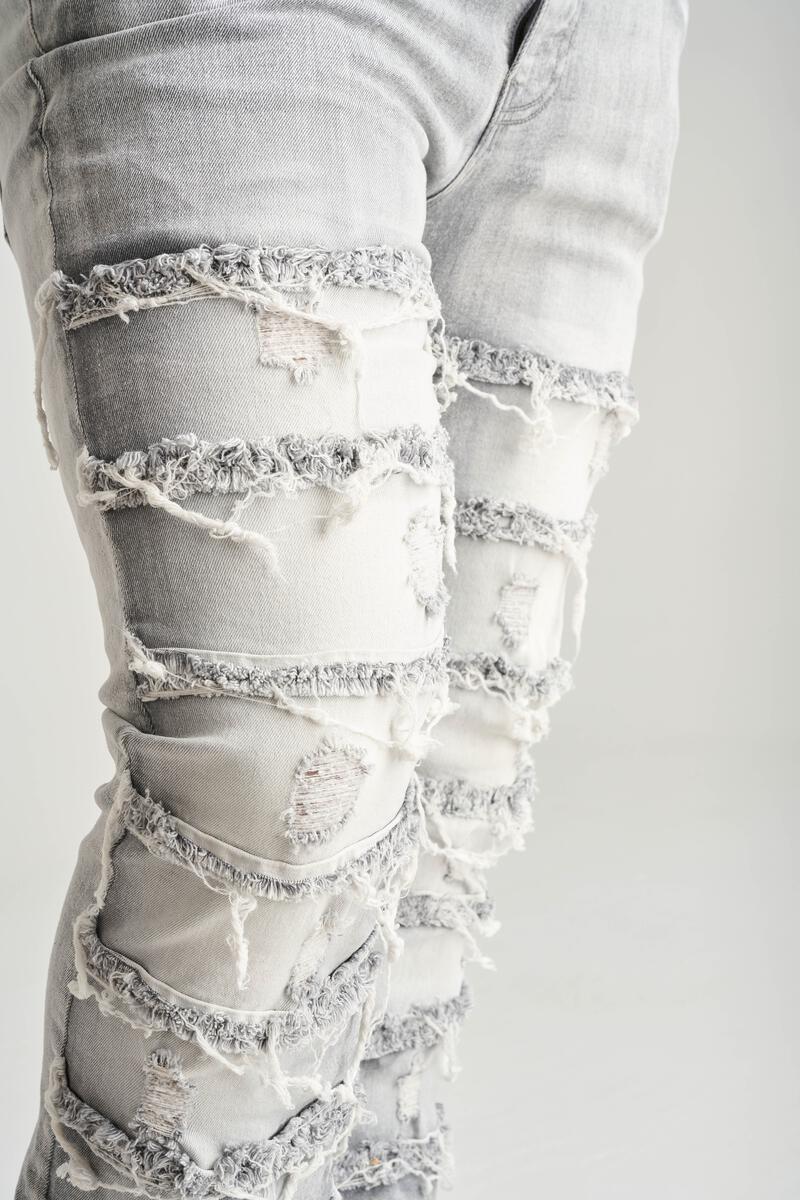 Stretch Stacked Denim With Frayed Patch Grey